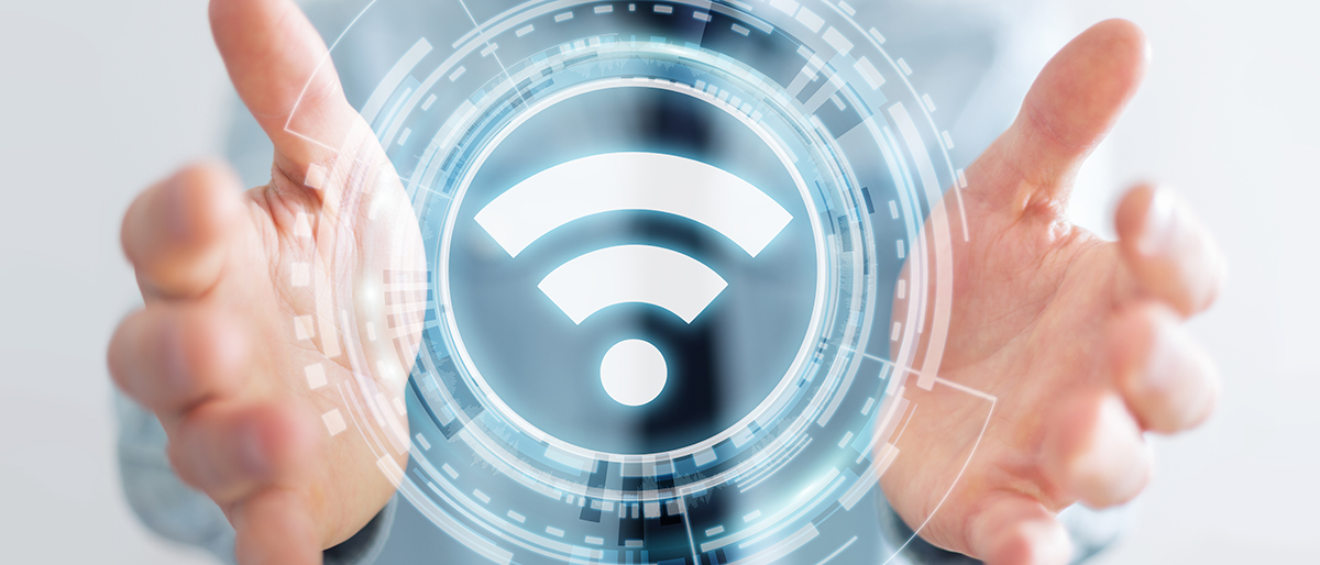 Kostenfreies W-LAN auf dem Messegelände Zwei Hände halten symbolisch ein WLAN-Icon